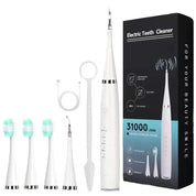 Spazzolino elettrico bianco con testine di ricambio, cavo USB e confezione nera. Pulizia dentale ad alta frequenza, 31000 vibrazioni/minuto.