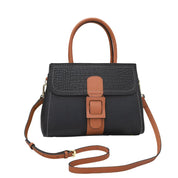 Borsa a mano in pelle nera con dettagli marroni, tracolla regolabile, chiusura a fibbia, design elegante e moderno. Accessorio moda donna.
