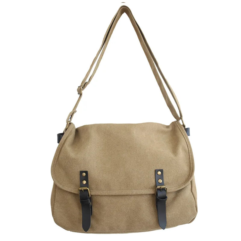 Borsa a tracolla in tela beige con fibbie nere, design casual e spazioso, ideale per uomo e donna. Accessorio moda versatile e resistente.