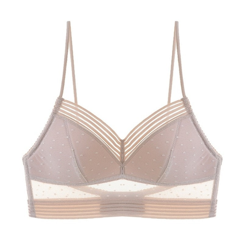 Reggiseno bralette trasparente beige con spalline sottili, design a pois, senza ferretto. Intimo femminile elegante e confortevole.