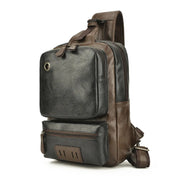 Zaino a tracolla in pelle nera e marrone, design moderno, tasche multiple, ideale per viaggi e lavoro. Accessorio moda uomo, resistente e versatile.