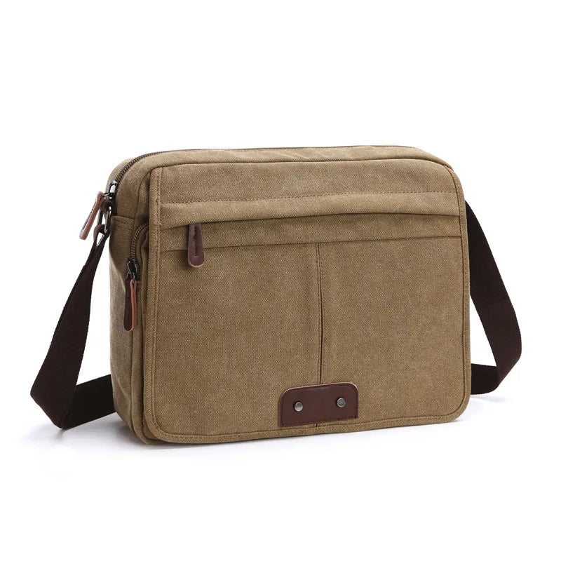Borsa a tracolla in tela marrone, design unisex, con tasche multiple e cerniere, ideale per lavoro e viaggio. Stile casual e resistente.
