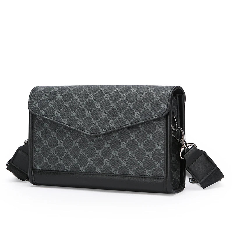 Borsa a tracolla nera in pelle con motivo geometrico, chiusura a patta, tracolla regolabile. Elegante accessorio moda per uomo e donna.