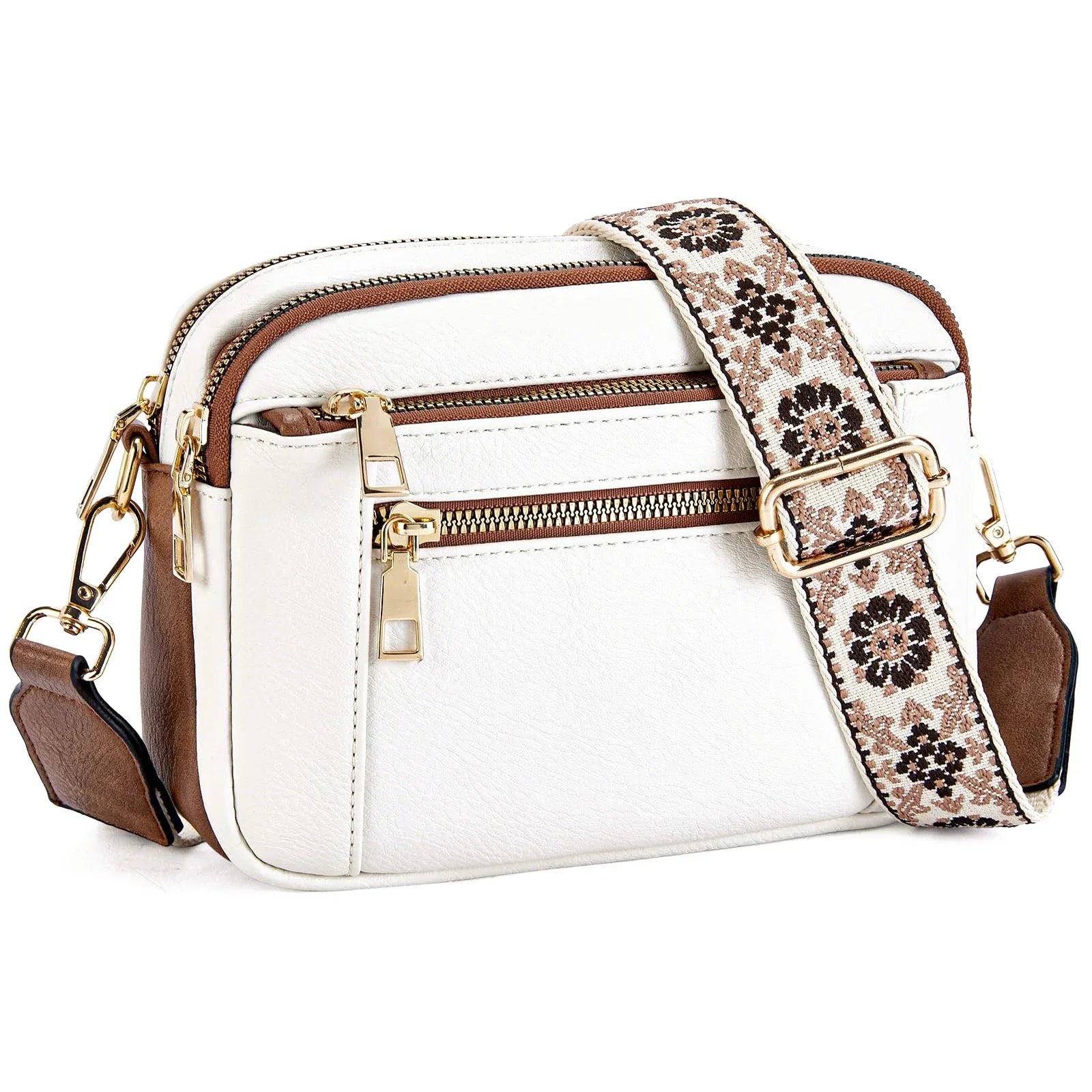 Borsa a tracolla bianca in pelle sintetica con dettagli marroni, cerniere dorate e tracolla regolabile floreale. Accessorio moda elegante e versatile.