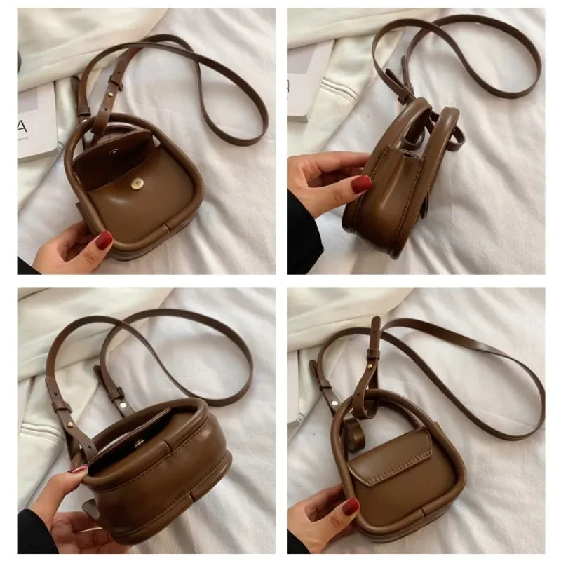 Borsa a tracolla marrone in pelle, design compatto, chiusura a bottone, ideale per moda donna, accessorio elegante e versatile per ogni occasione.