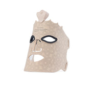 Maschera LED per terapia facciale, design beige con motivi circolari, fori per occhi e bocca, dispositivo portatile per cura della pelle e ringiovanimento.