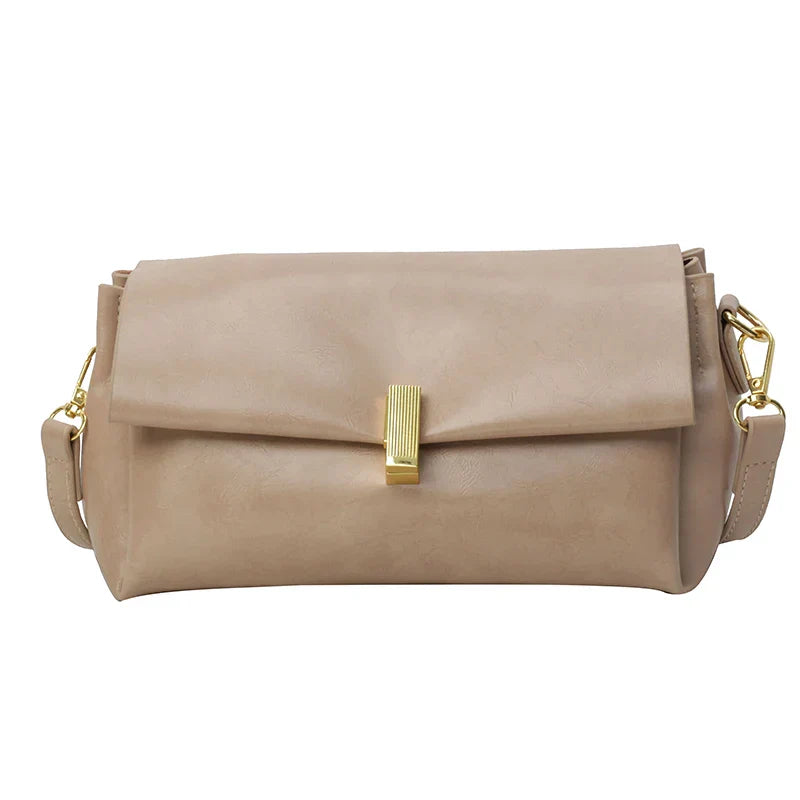 Borsa a tracolla beige in pelle sintetica con chiusura dorata, design elegante e moderno, ideale per moda femminile e accessori di tendenza.