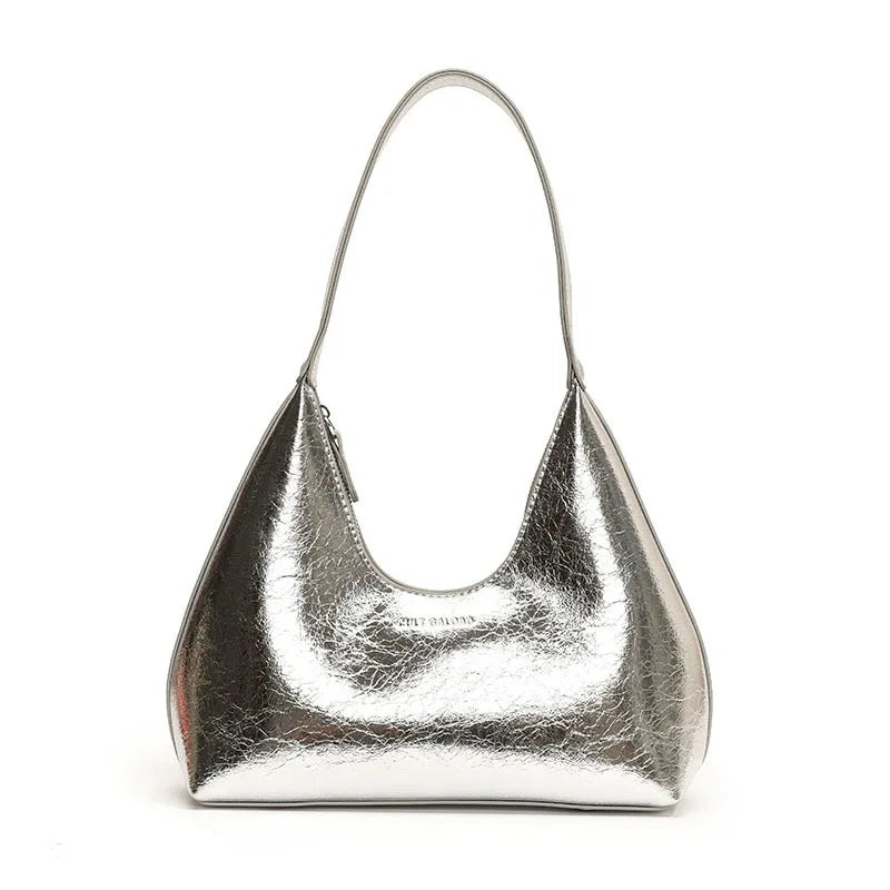 Borsa a spalla in pelle argentata metallizzata, design moderno e minimalista, ideale per moda donna, accessorio elegante e versatile.