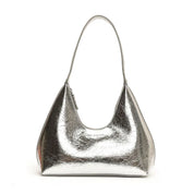 Borsa a spalla in pelle argentata metallizzata, design moderno e minimalista, ideale per moda donna, accessorio elegante e versatile.