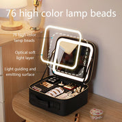 Specchio cosmetico con luci LED, 76 perle luminose, strato ottico morbido, superficie guida luce, custodia organizer su tavolo in legno.