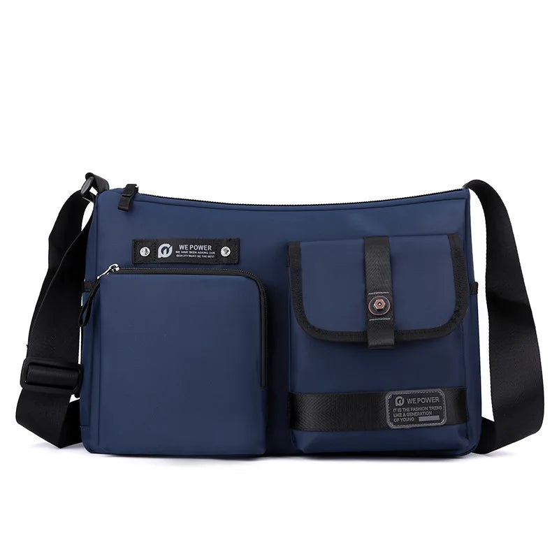 Borsa a tracolla blu scuro con tasche multiple, design moderno, chiusura a zip e fibbia, ideale per uomo e donna, perfetta per viaggi e lavoro.