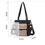 Borsa a tracolla nera e beige, dimensioni 37x12x39 cm, con tasche frontali e spazio per rivista A4. Design elegante e funzionale per uso quotidiano.