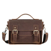 Borsa a tracolla in pelle marrone vintage, design elegante con fibbie in metallo, ideale per lavoro e scuola. Accessorio moda uomo e donna.