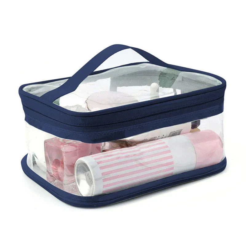 Borsa trasparente da viaggio con cerniera blu, contenente articoli da toeletta. Ideale per organizzare cosmetici e accessori.