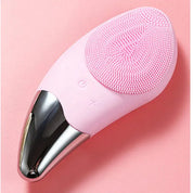 Dispositivo di pulizia viso in silicone rosa, design ergonomico, con base in metallo. Spazzola elettrica per cura della pelle, esfoliazione delicata.