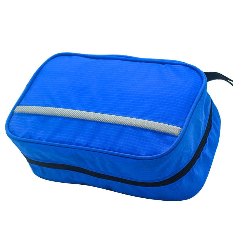 Borsa organizer da viaggio blu con cerniera, design compatto e resistente, ideale per valigia, accessori e articoli da toeletta.