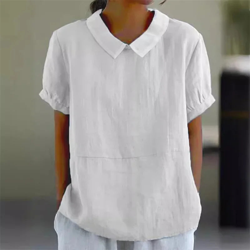 Camicia bianca da donna in lino, maniche corte, colletto classico, stile casual elegante. Ideale per look estivi e primaverili.