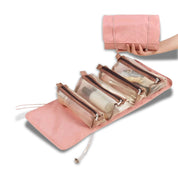 Astuccio da viaggio rosa con tasche trasparenti, ideale per cosmetici e articoli da toeletta. Design pieghevole, pratico e compatto.