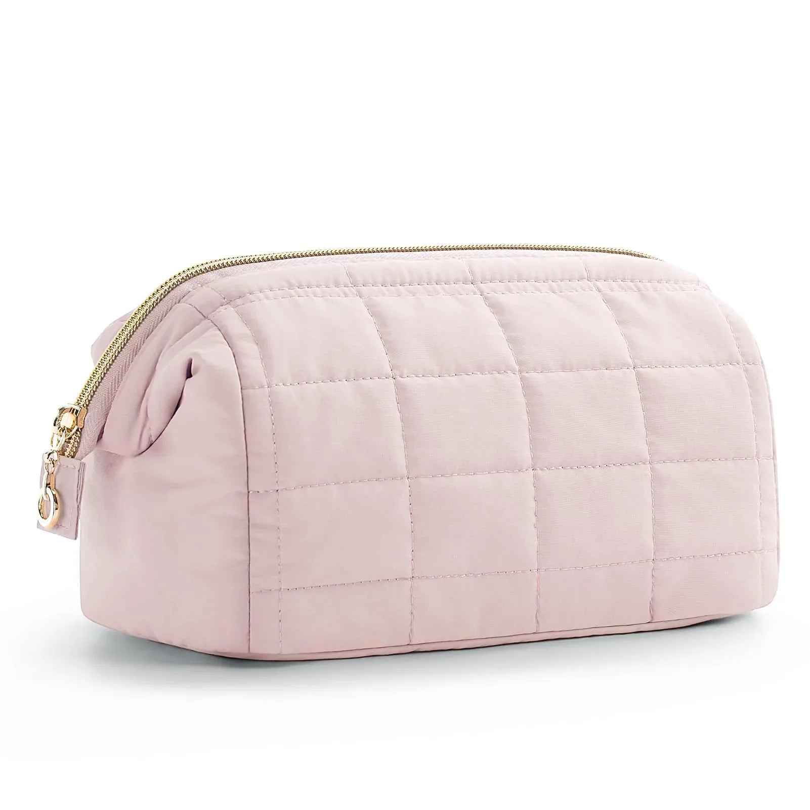 Astuccio da toilette trapuntato rosa chiaro con cerniera dorata, design elegante e spazioso, ideale per viaggi e organizzazione cosmetici.