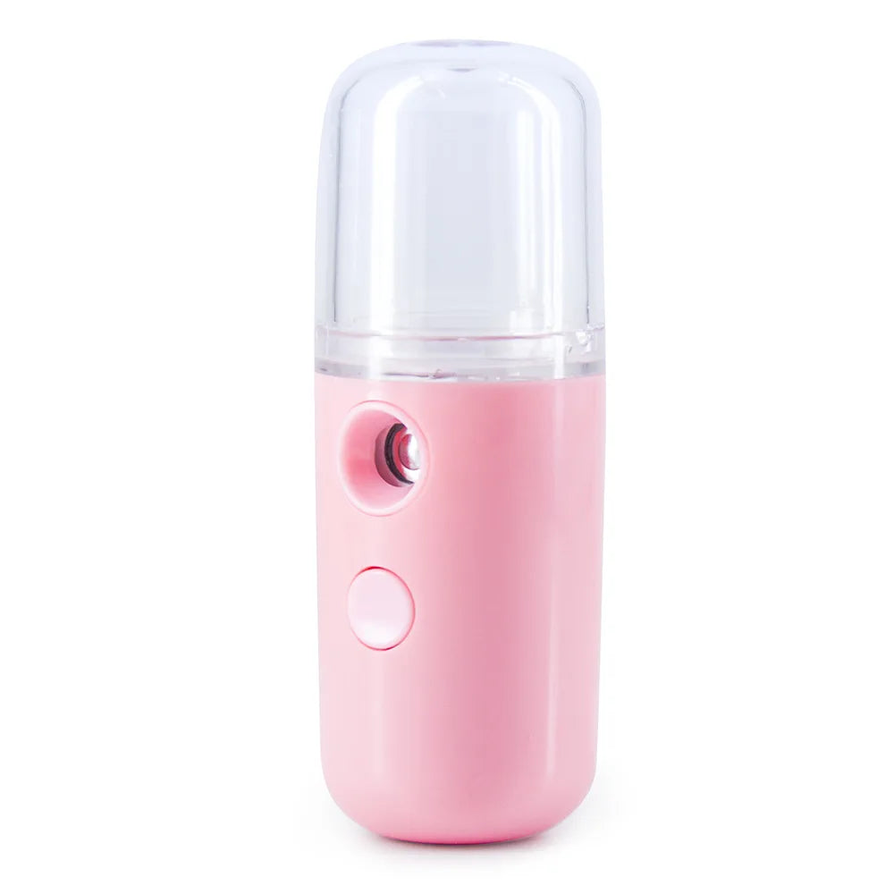 Umidificatore portatile rosa, nebulizzatore viso ricaricabile USB, design compatto, ideale per idratazione pelle e cura personale.