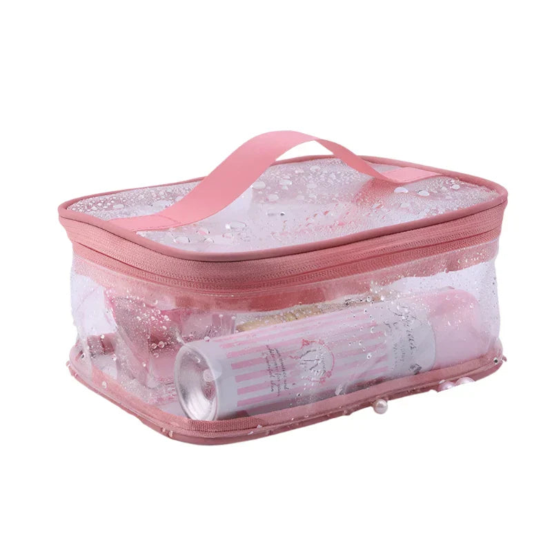 Borsa trasparente da viaggio in PVC rosa con cerniera, ideale per cosmetici e articoli da toeletta, resistente all'acqua, pratica e capiente.