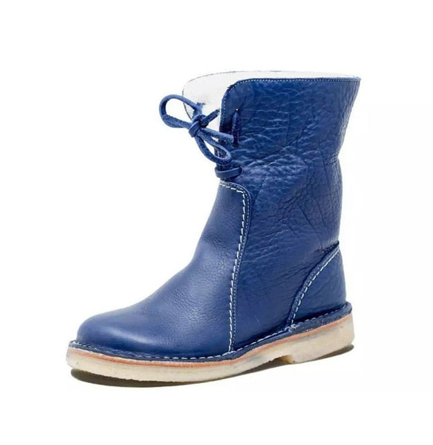 Stivale in pelle blu per bambini, con lacci e suola in gomma chiara. Calzature invernali eleganti e resistenti. Ideale per moda bimbi.