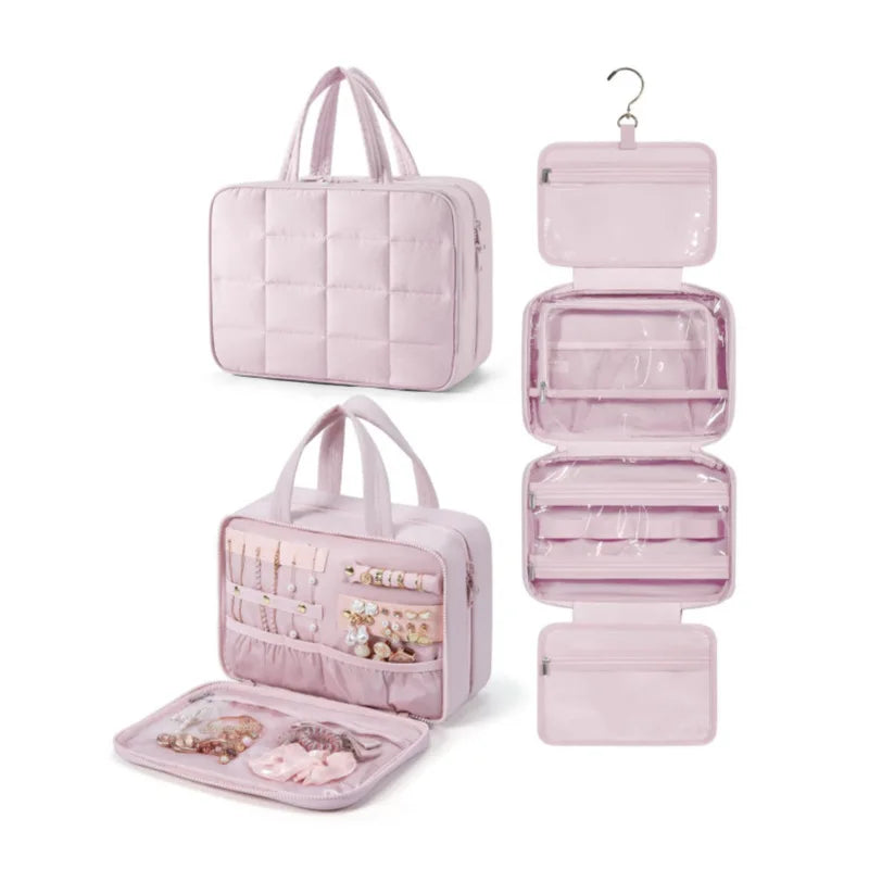 Borsa organizer da viaggio rosa con ganci, tasche trasparenti e scomparti multipli per cosmetici e accessori. Design elegante e funzionale.