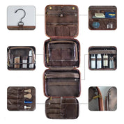 Borsa da toilette in pelle marrone con ganci, scomparti multipli per articoli da bagno, zip robuste, design pieghevole, ideale per viaggi e organizzazione.