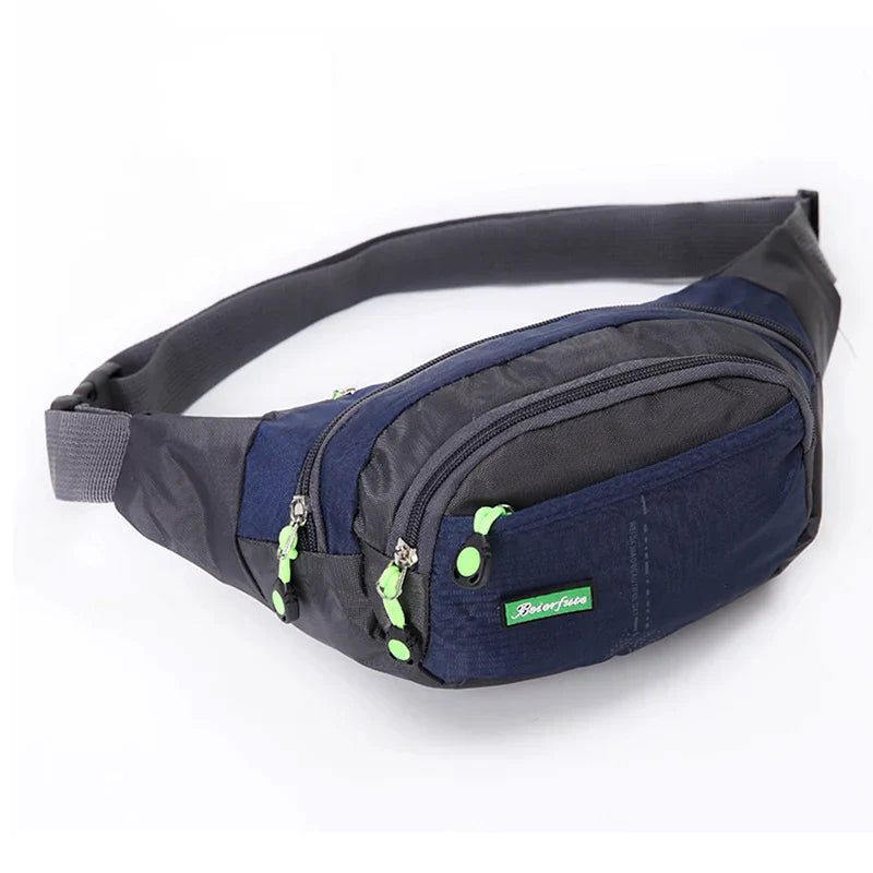 Marsupio sportivo blu e grigio con cerniere verdi, ideale per attività all'aperto. Design compatto e resistente, perfetto per escursioni e viaggi.