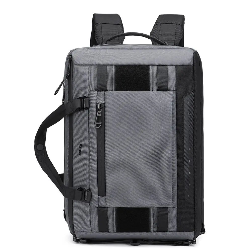 Zaino da viaggio grigio e nero, design moderno, tasca frontale con zip, manico laterale, spallacci imbottiti. Ideale per lavoro e tempo libero.