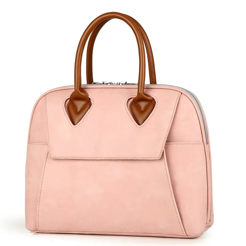 Borsa a mano in pelle rosa con manici marroni, design elegante e moderno, ideale per moda femminile, accessorio di tendenza per ogni occasione.