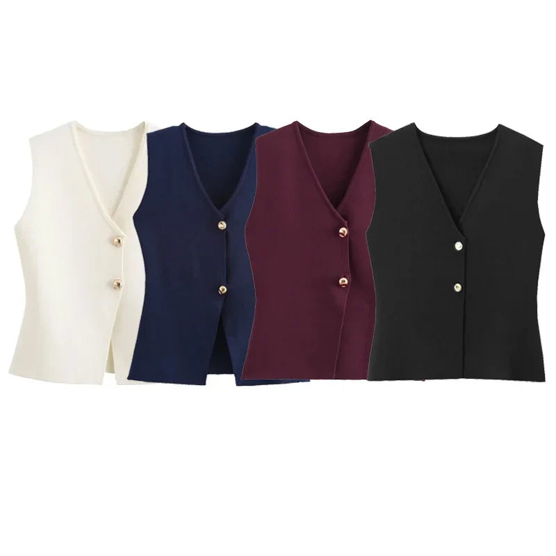 Quattro gilet da donna senza maniche in colori bianco, blu, bordeaux e nero, con scollo a V e bottoni decorativi. Moda elegante e versatile.
