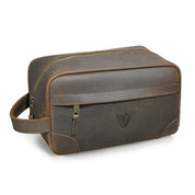 Borsa da toilette in pelle marrone vintage con cerniera dorata, manico laterale e logo inciso. Elegante e resistente, ideale per viaggi.