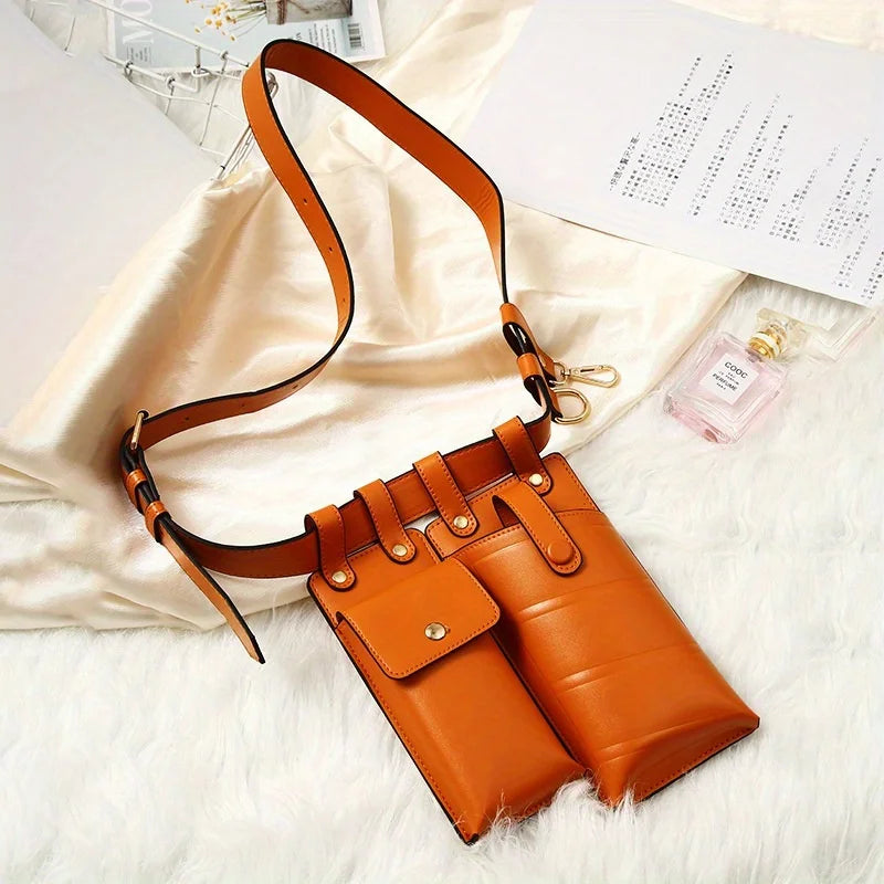 Borsa a tracolla in pelle marrone con doppia tasca, design elegante su sfondo bianco. Accessorio moda donna, stile casual chic.