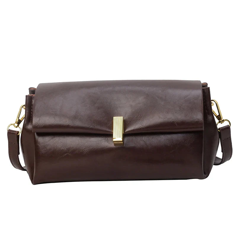 Borsa a tracolla in pelle marrone scuro con chiusura dorata, design elegante e moderno, accessorio moda donna, ideale per ogni occasione.