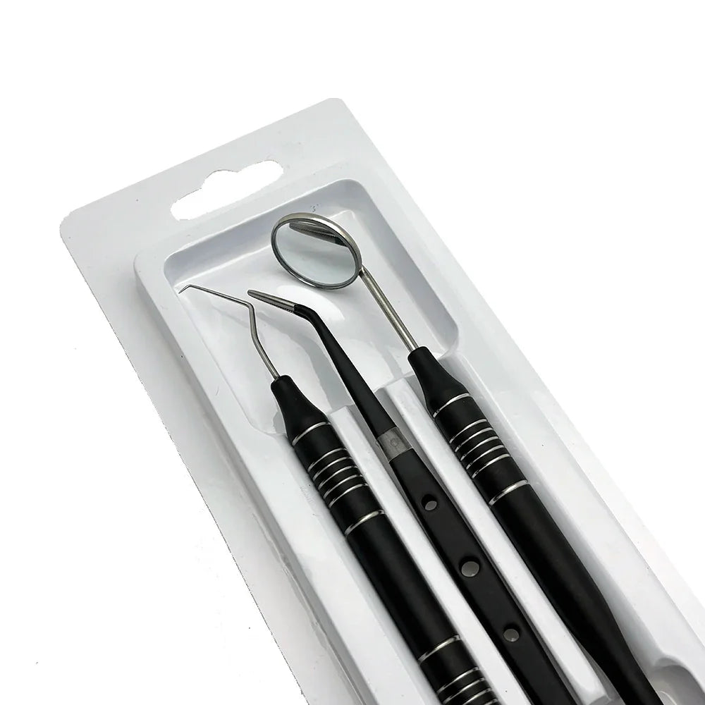 Set di strumenti dentali in acciaio inox, specchietto, sonda e scaler, confezione blister, strumenti per igiene orale professionale.