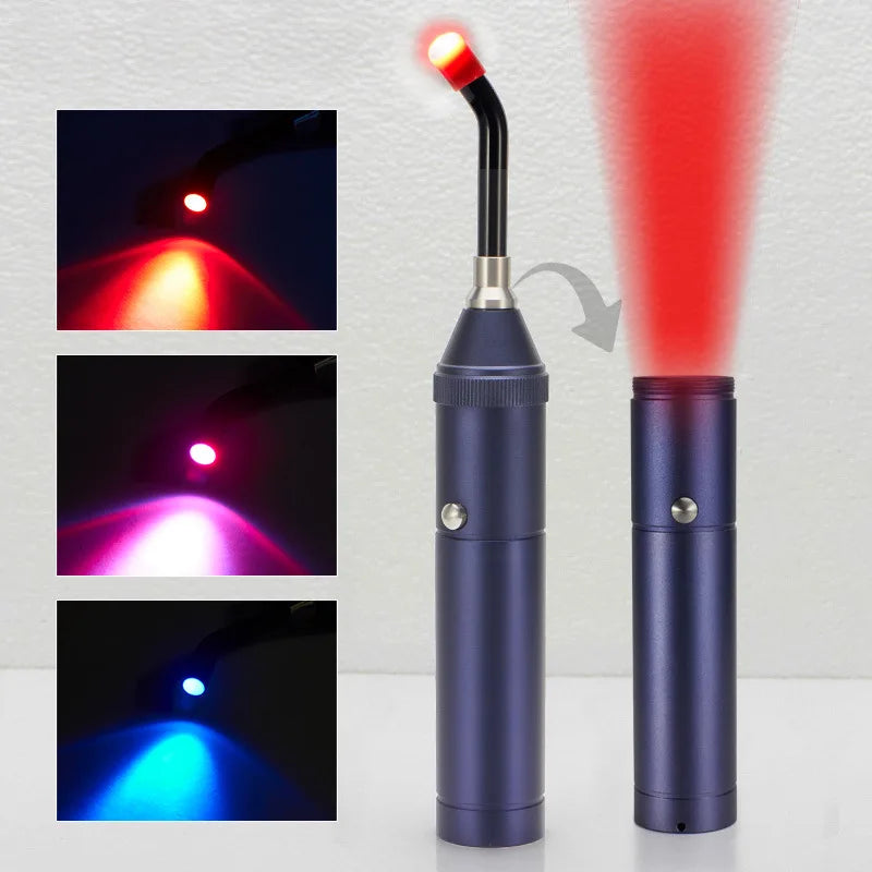 Torcia LED dentale blu con luce rossa, blu e viola, design ergonomico, ideale per studi dentistici. Accessorio professionale per odontoiatria.