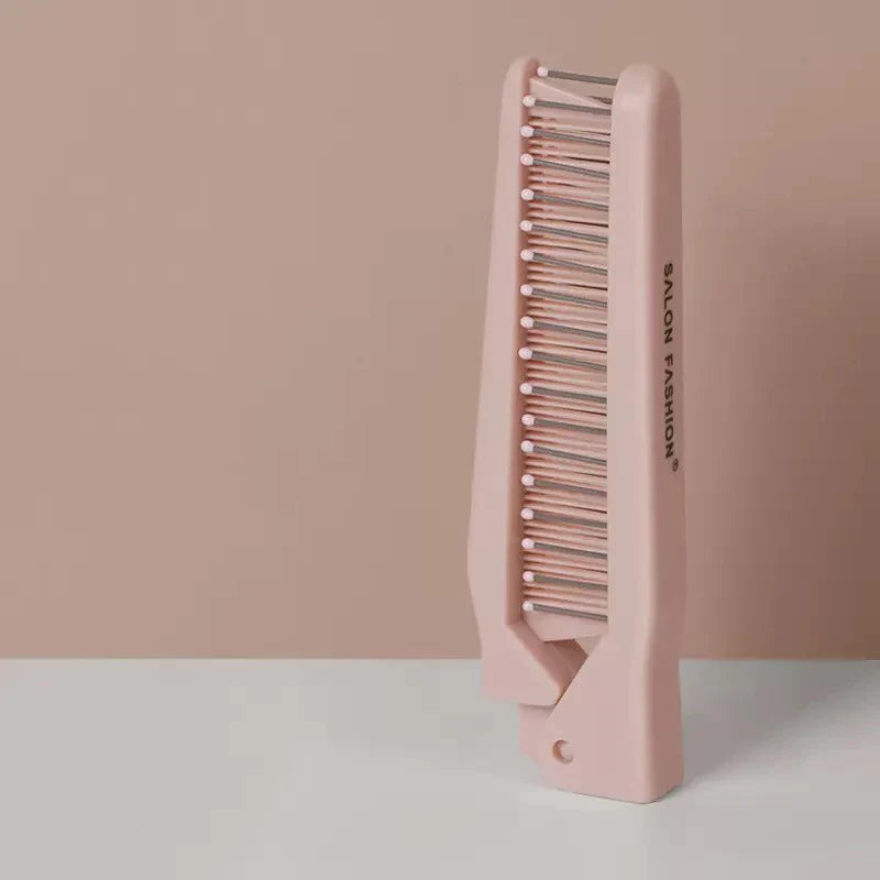 Pettine lisciante rosa per capelli, design ergonomico, ideale per styling professionale, riduce l'effetto crespo, adatto a tutti i tipi di capelli.