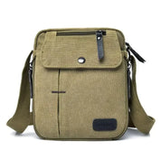 Borsa a tracolla in tela verde oliva, design compatto con tasca frontale e chiusura a zip, ideale per uomo, stile casual e resistente.