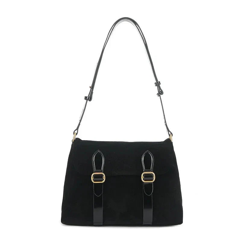 Borsa a tracolla nera in pelle con fibbie dorate, design elegante e moderno, ideale per moda donna, accessorio versatile per ogni occasione.