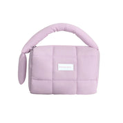 Borsa a mano trapuntata rosa pastello, design moderno, manico imbottito, ideale per moda femminile. Accessorio elegante e versatile.