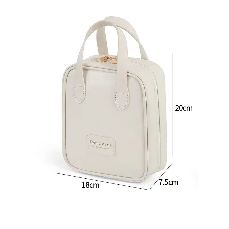 Borsa da viaggio bianca in pelle, dimensioni 20x18x7,5 cm, con manici e chiusura a zip. Ideale per organizzare accessori da viaggio.