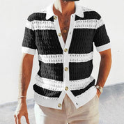Camicia uomo a righe nere e bianche, maniche corte, bottoni frontali, stile casual estivo, tessuto leggero, ideale per moda estiva.
