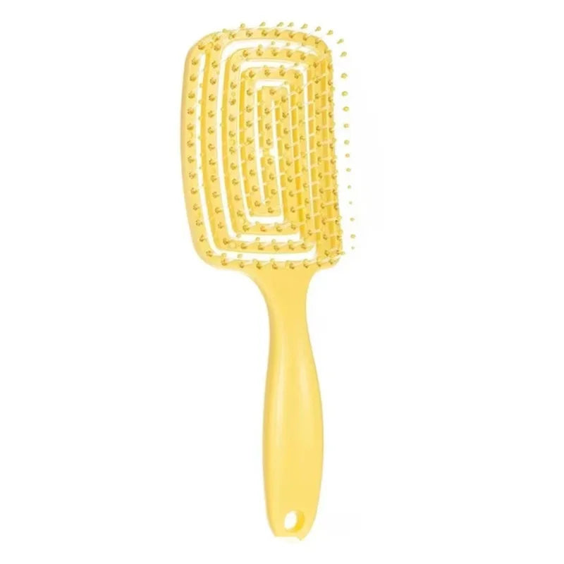 Spazzola per capelli gialla, design ventilato, setole flessibili, ideale per districare e asciugare velocemente, manico ergonomico.