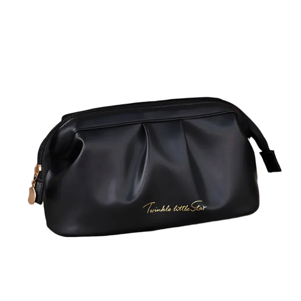 Astuccio cosmetico nero in pelle sintetica con cerniera dorata, design elegante e scritta "Twinkle little Star". Ideale per trucco e accessori.