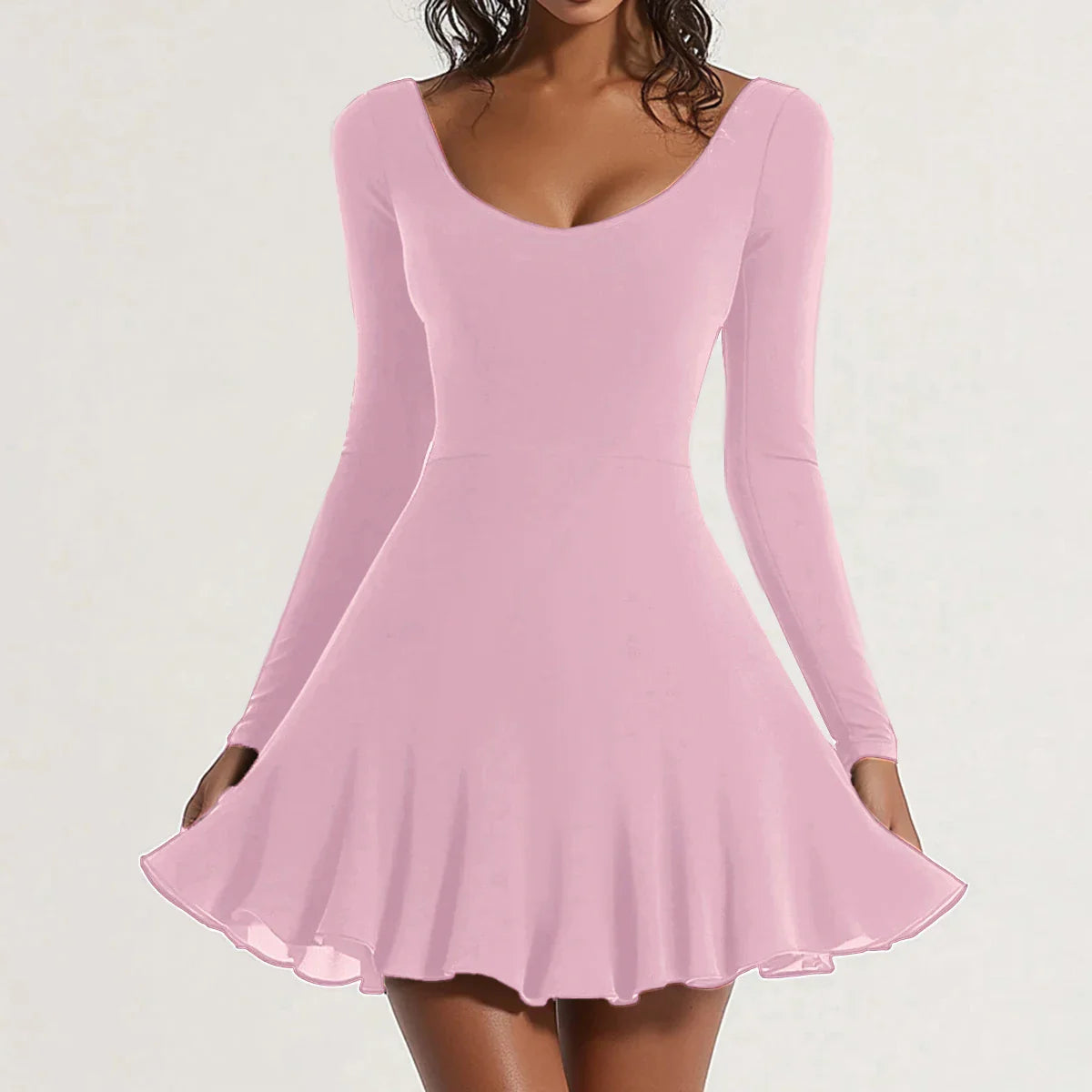Abito rosa a maniche lunghe, scollo rotondo, gonna svasata. Elegante e femminile, perfetto per occasioni speciali e moda donna.