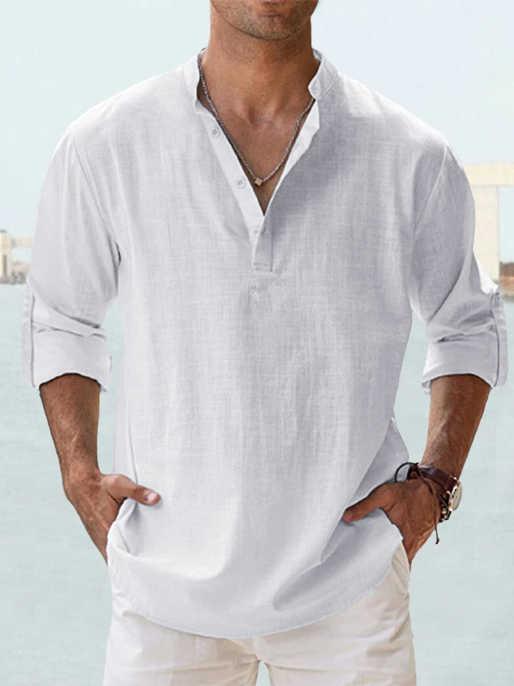 Camicia uomo bianca in lino, maniche lunghe, colletto alla coreana, stile casual estivo. Ideale per look eleganti e rilassati.