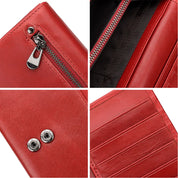 Portafoglio donna in pelle rossa con cerniera e bottoni, scomparti per carte di credito. Elegante accessorio moda, alta qualità, design moderno.