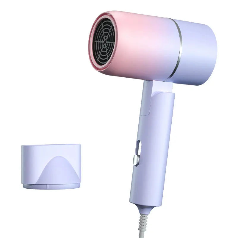Asciugacapelli portatile bicolore rosa e viola con accessorio rimovibile, design moderno, leggero, ideale per viaggi e uso quotidiano.