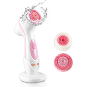 Spazzola elettrica per pulizia viso, impermeabile, con testine intercambiabili rosa, ideale per esfoliazione e cura della pelle.